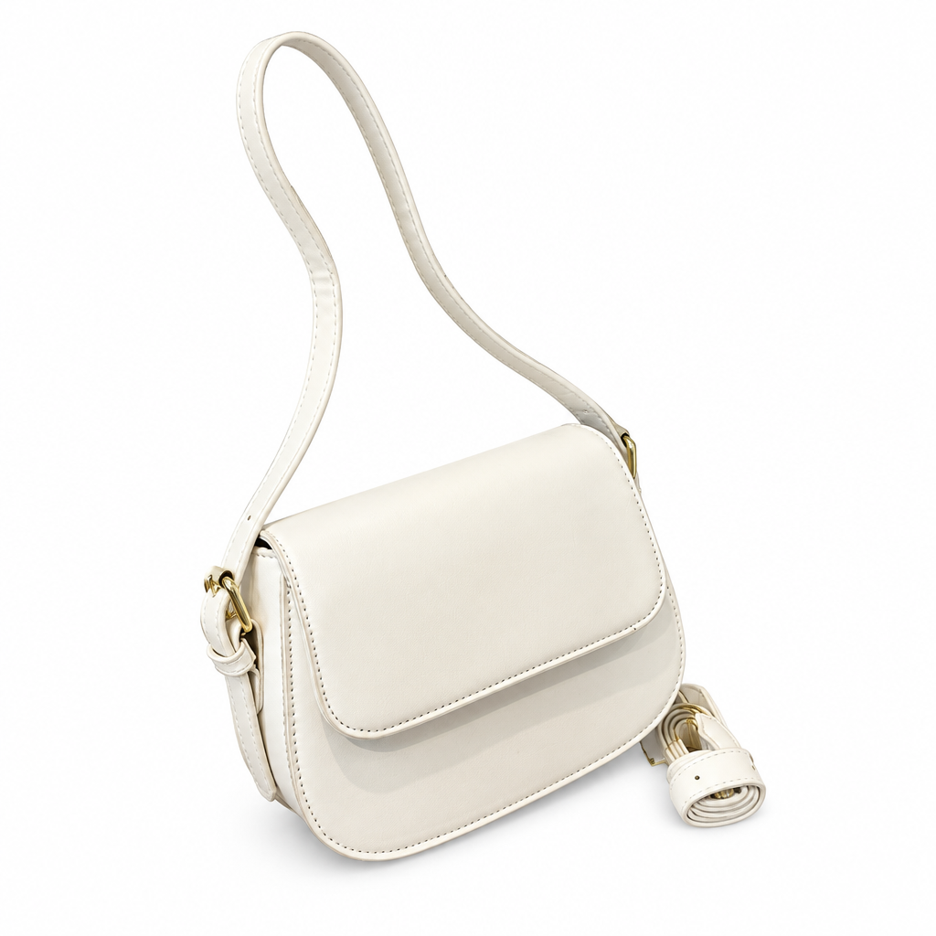Cream shoulder bag on white background