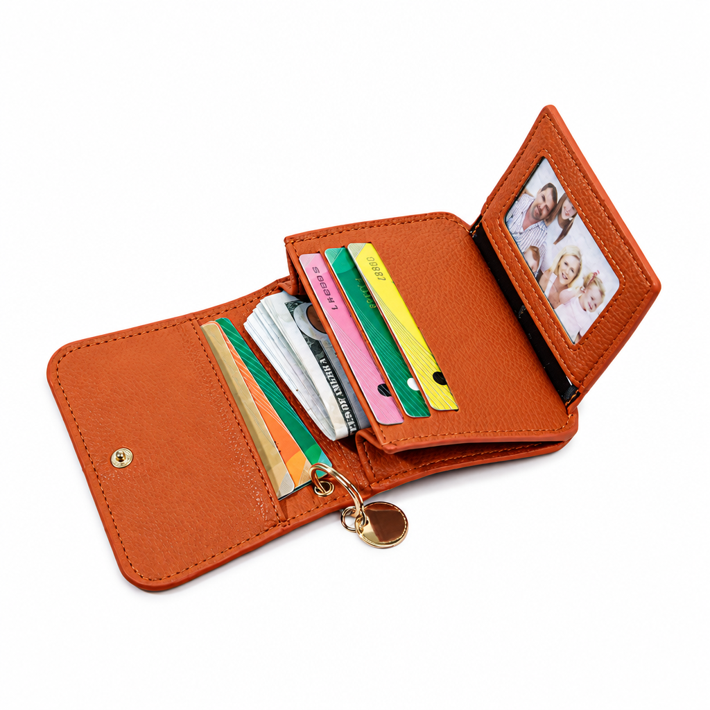 Open orange wallet on white